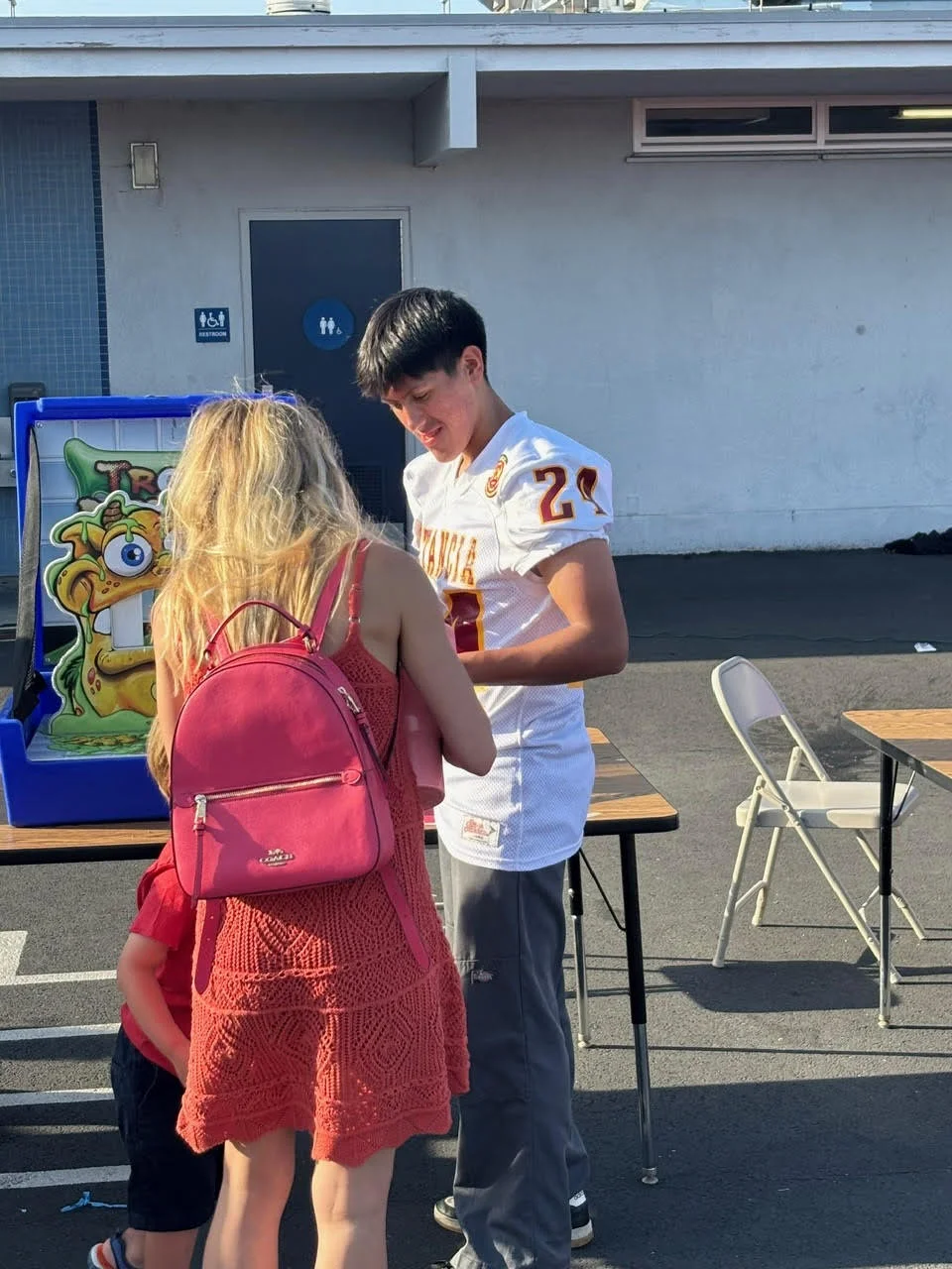 Estancia Footall Working the Adams El Carnival