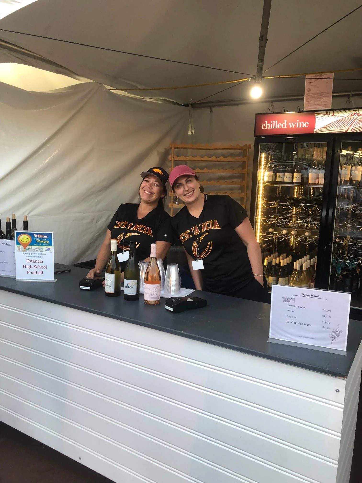 Smiles working the booth