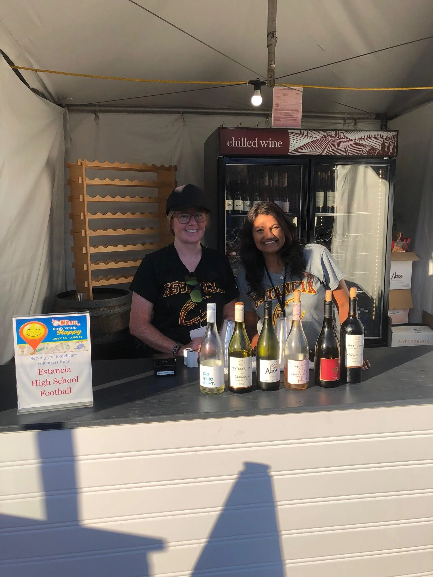 Smiles working the booth